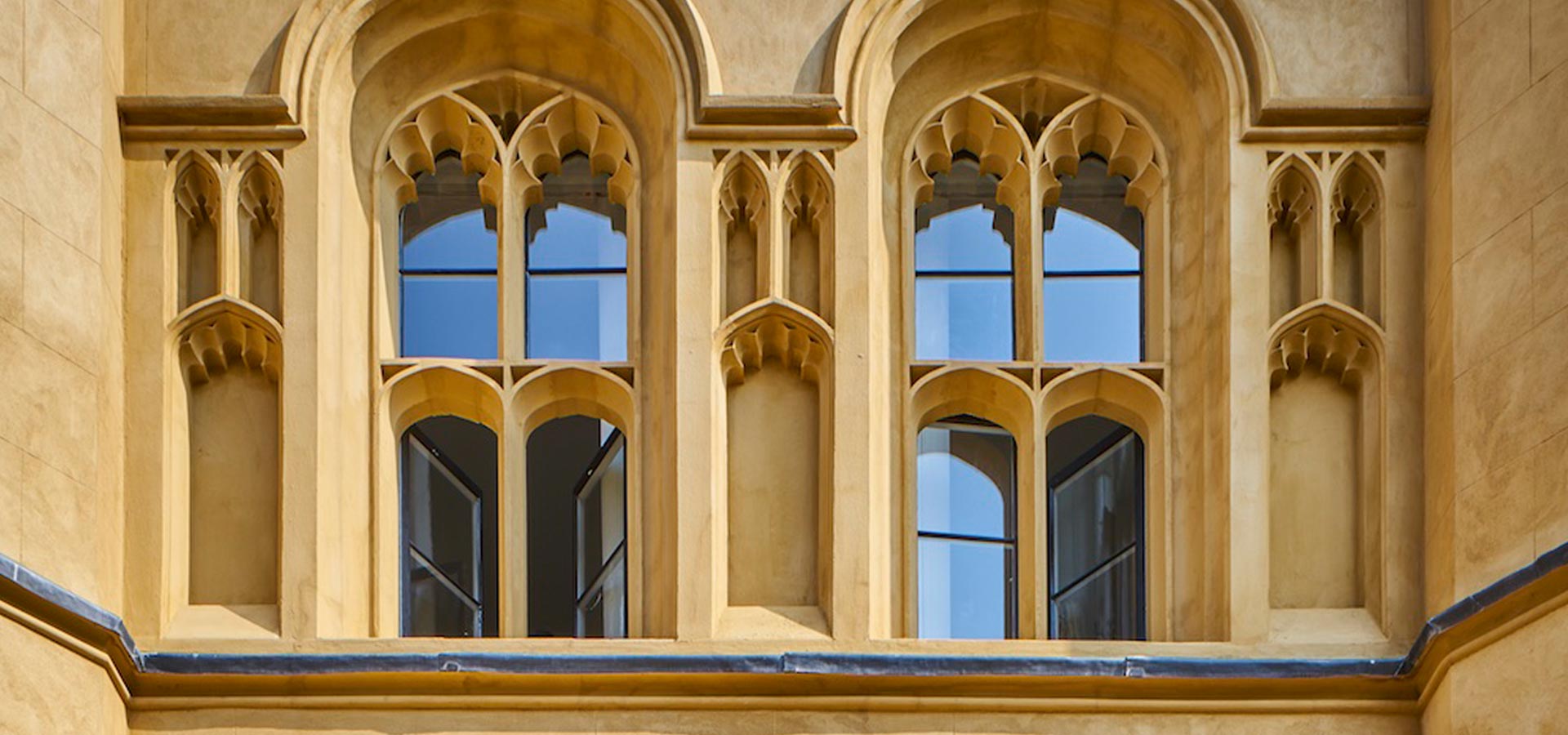 A heritage mansion with double gazed custom made arched windows